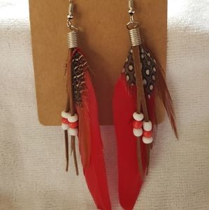 Red feather earrings